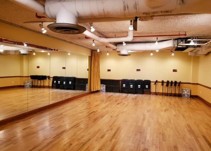 Photo of a large empty studio.